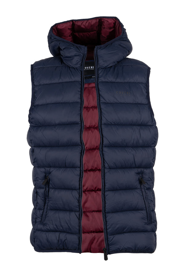 Gilet smanicato trapuntato con cappuccio non staccabile e interno in contrasto cromatico, full zip e tasche laterali