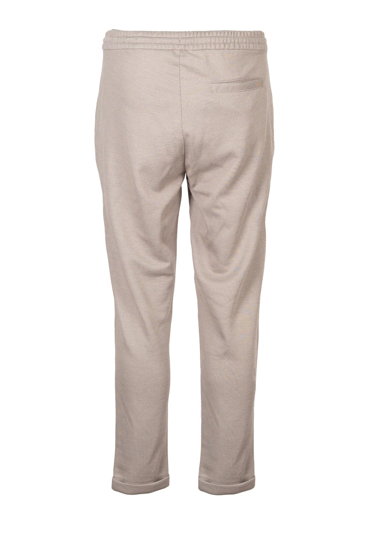 Pantalone jogger uomo Coveri Collection in texure piquet con coulisse e tasche con cerniera sui fianchi